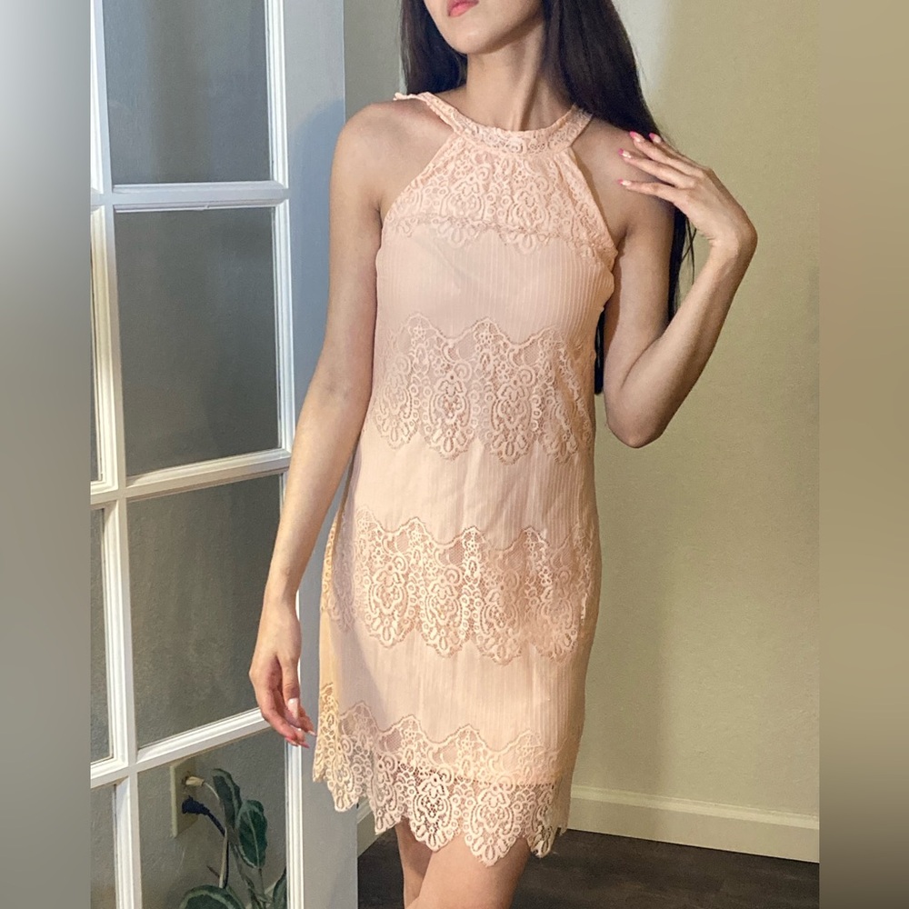 Cute light pink dress from Charlotte Russe. Lightly used.